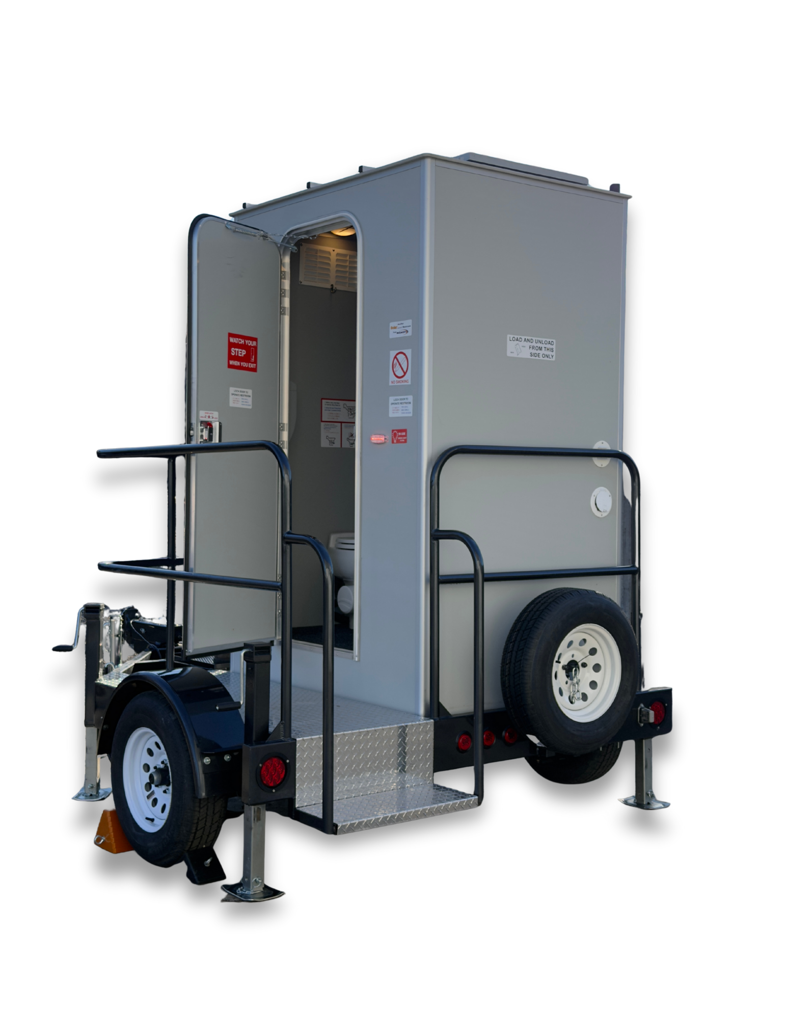 Outside the home in NY & NJ, parked a portable two-station restroom trailer