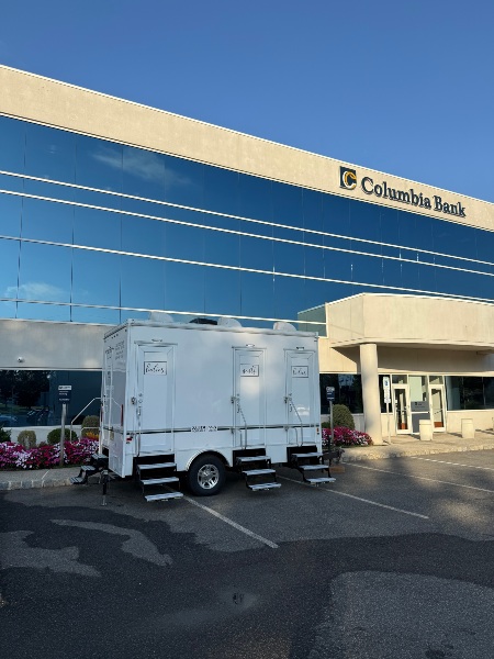 4-stall restroom trailer outside Columbia Bank