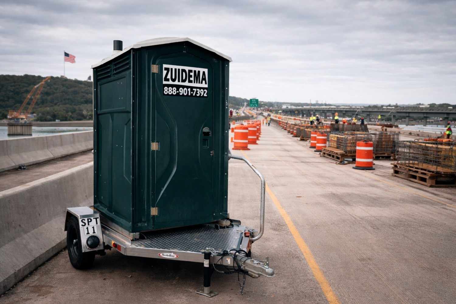 Portable toilet on trailer at construction site, available for rent in New York and New Jersey