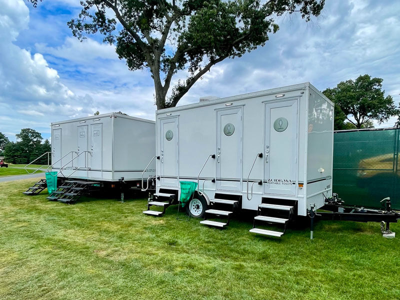 two restroom trailers outside