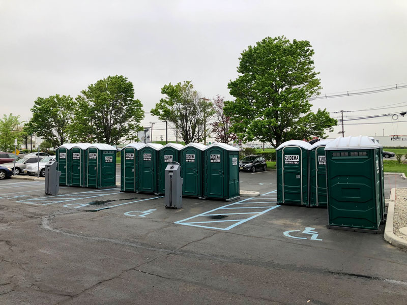 green Zuidema portable toilets and portable sinks